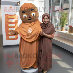 Brown Tikka Masala mascot costume character dressed with a Wrap Dress and Beanies