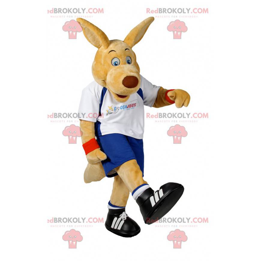 Beige dog mascot in sportswear. Dog costume - Redbrokoly.com