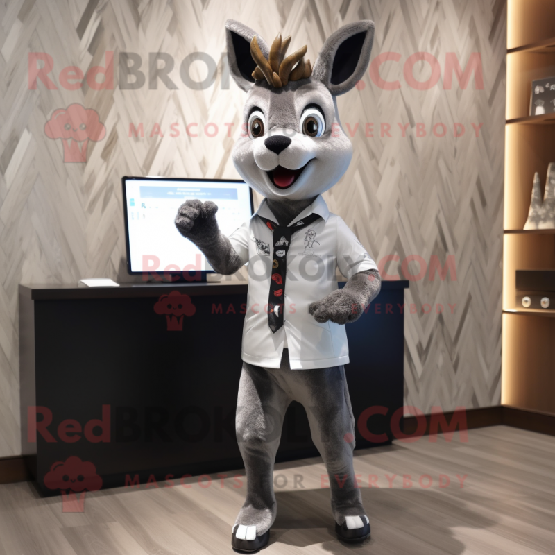 Silver Deer mascot costume character dressed with a Suit Jacket and Earrings Silver Deer mascot costume character dressed with a Suit Jacket and Earrings