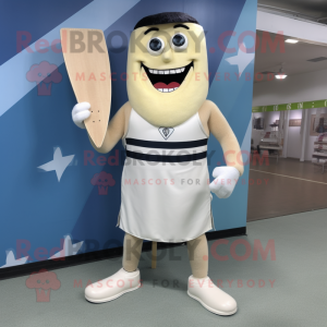 Cream Knife Thrower mascot costume character dressed with a Board Shorts and Cummerbunds