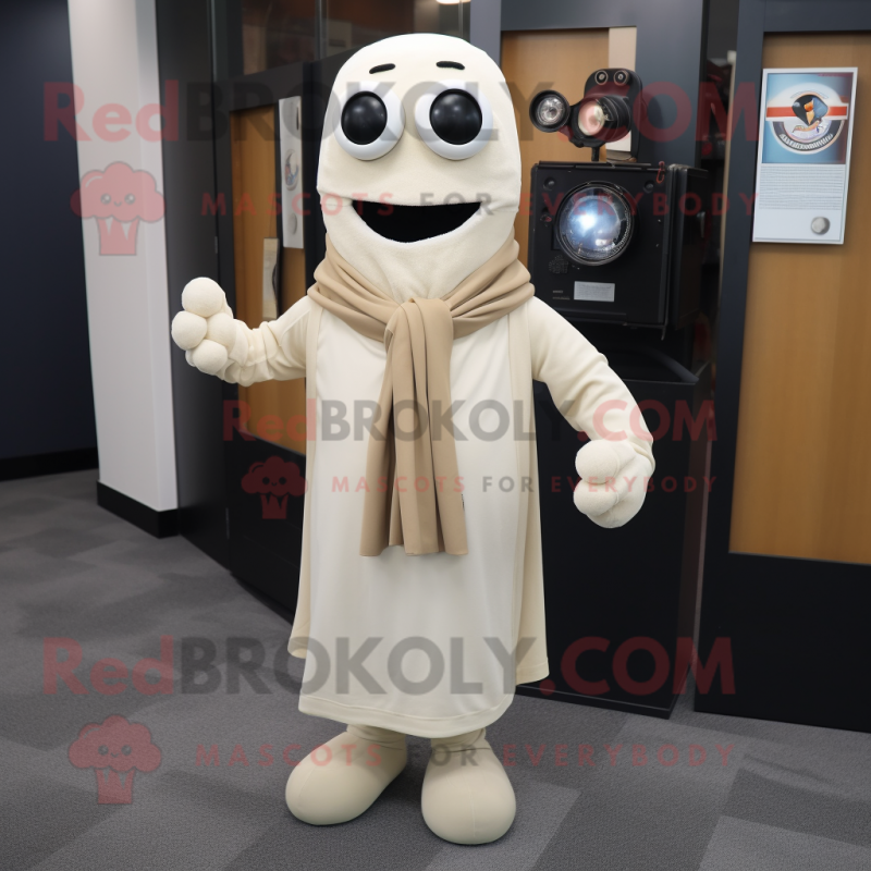Cream Camera mascot costume character dressed with a Blazer and Scarf clips Cream Camera mascot costume character dressed with a Blazer and Scarf clips
