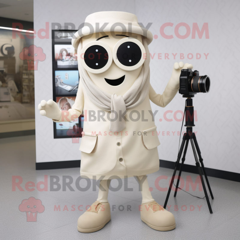 Cream Camera mascot costume character dressed with a Blazer and Scarf clips Cream Camera mascot costume character dressed with a Blazer and Scarf clips