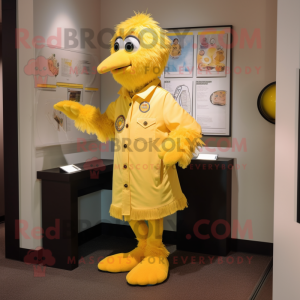 Yellow Momentum mascot costume character dressed with a Button-Up Shirt and Shawl pins