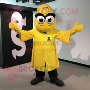 Yellow Momentum mascot costume character dressed with a Button-Up Shirt and Shawl pins