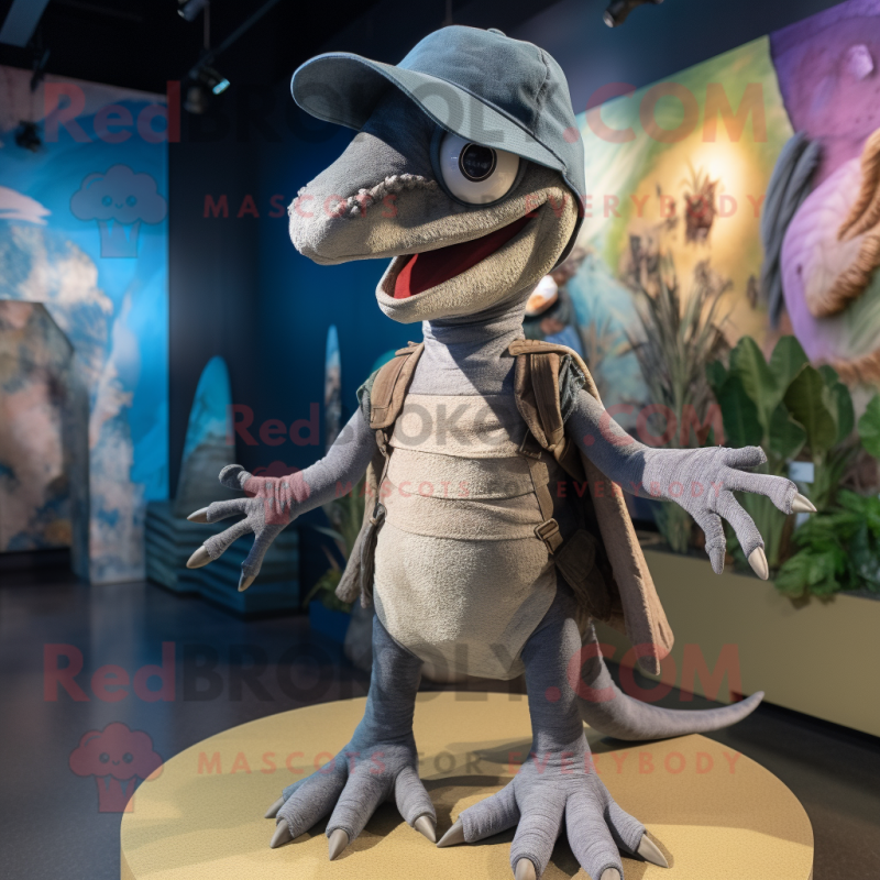 Gray Dimorphodon mascot costume character dressed with a Shorts and Beanies