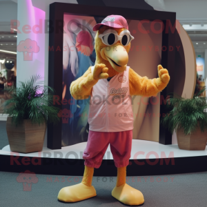 Gold Flamingo mascot costume character dressed with a Bermuda Shorts and Caps