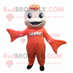 Cream Salmon mascot costume character dressed with a Jumpsuit and Hair clips