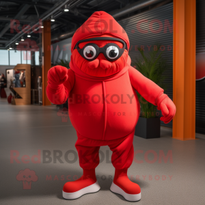 Red Cyclops mascot costume character dressed with a Joggers and Mittens
