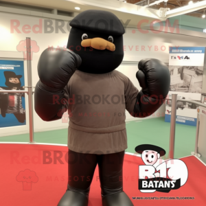 Black Boxing Glove mascot costume character dressed with a Bomber Jacket and Beanies