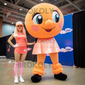 Peach Volleyball Ball mascot costume character dressed with a Mini Skirt and Caps