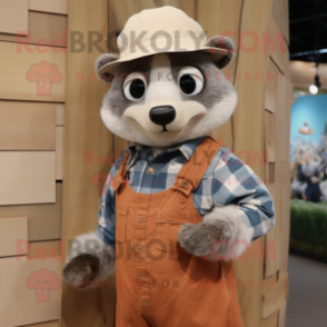 Peach Badger mascot costume character dressed with a Chambray Shirt and Hats