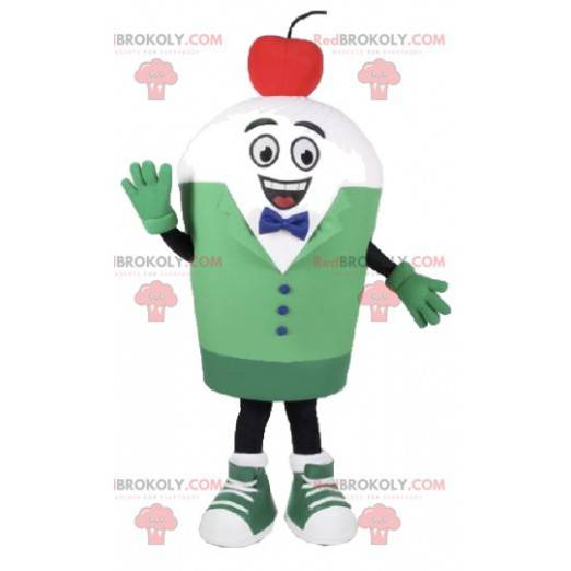 Witte sneeuwpop mascotte in groen kostuum - Redbrokoly.com