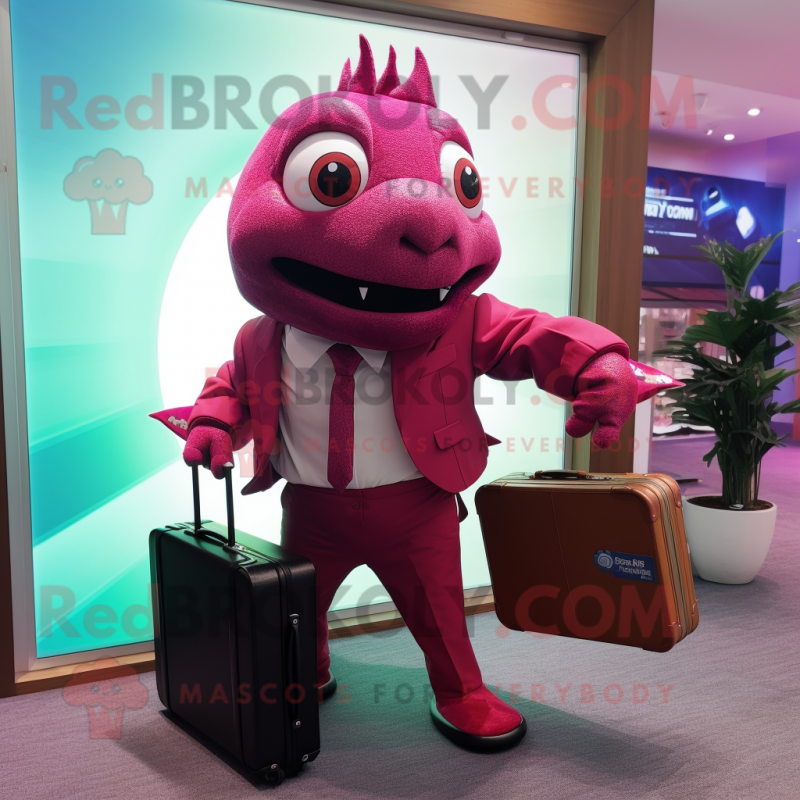 Magenta Piranha mascot costume character dressed with a Suit Jacket and Briefcases