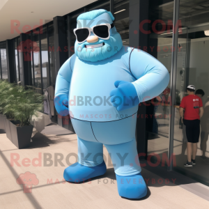 Sky Blue Strongman mascot costume character dressed with a A-Line Dress and Sunglasses