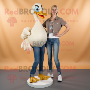 Tan Swan mascot costume character dressed with a Bootcut Jeans and Shoe clips