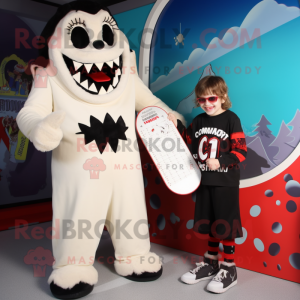 Cream Vampire mascot costume character dressed with a Board Shorts and Mittens