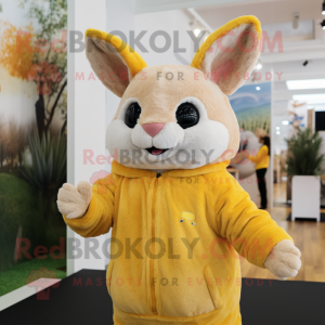 Yellow Chinchilla mascot costume character dressed with a Sweatshirt and Mittens
