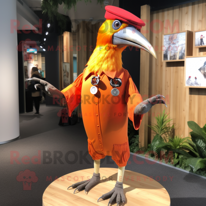 Orange Woodpecker mascot costume character dressed with a Henley Tee and Cufflinks Orange Woodpecker mascot costume character dressed with a Henley Tee and Cufflinks