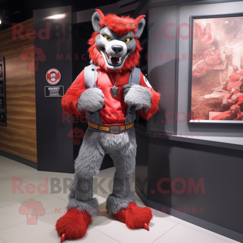 Red Werewolf mascot costume character dressed with a Jeans and Watches Red Werewolf mascot costume character dressed with a Jeans and Watches
