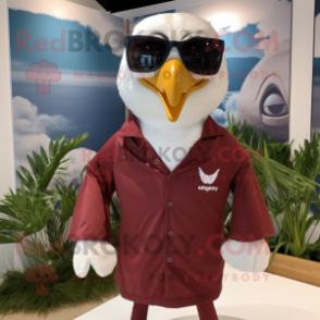 Maroon Albatross mascot costume character dressed with a Jumpsuit and Eyeglasses