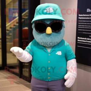 Teal Chief mascot costume character dressed with a V-Neck Tee and Eyeglasses