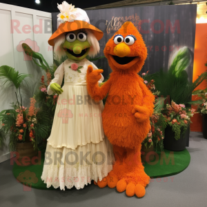 Orange Jambalaya mascot costume character dressed with a Wedding Dress and Brooches