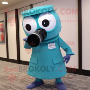 Teal Camera mascot costume character dressed with a Dress Pants and Headbands