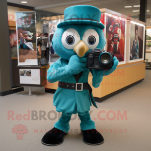 Teal Camera mascot costume character dressed with a Dress Pants and Headbands