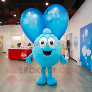 Sky Blue Heart Shaped Balloons mascot costume character dressed with a Graphic Tee and Rings