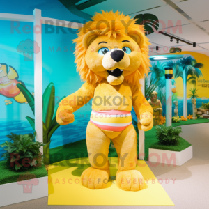 Yellow Tamer Lion mascot costume character dressed with a Bikini and Belts