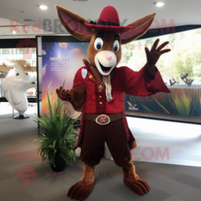 Maroon Gazelle mascot costume character dressed with a Flare Jeans and Hat pins