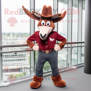 Maroon Gazelle mascot costume character dressed with a Flare Jeans and Hat pins
