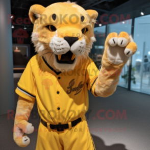 Yellow Smilodon mascot costume character dressed with a Baseball Tee and Tie pins