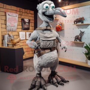 Gray Dodo Bird mascot costume character dressed with a Tank Top and Belts