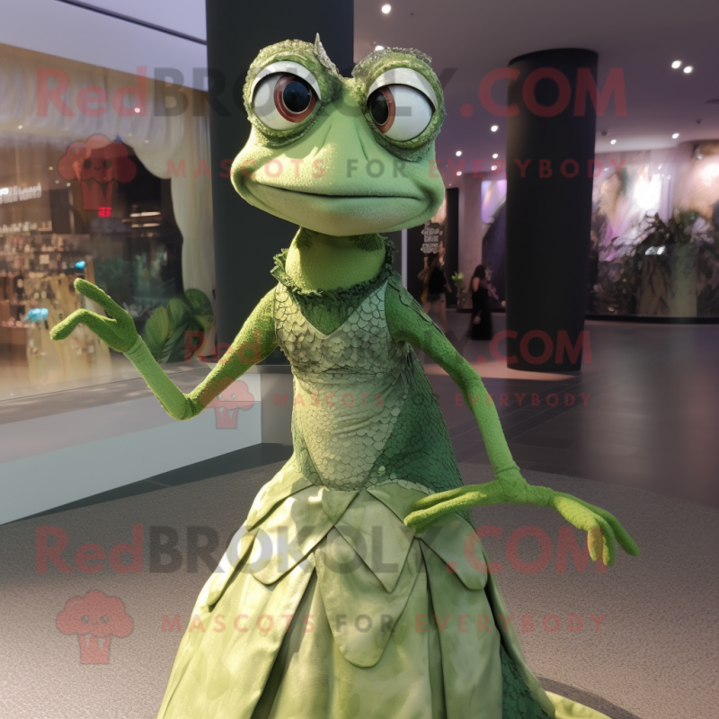 Olive Lizard mascot costume character dressed with a Evening Gown and Caps Olive Lizard mascot costume character dressed with a Evening Gown and Caps