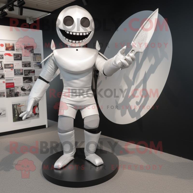 Silver Knife Thrower mascot costume character dressed with a Rash Guard and Cummerbunds Silver Knife Thrower mascot costume character dressed with a Rash Guard and Cummerbunds