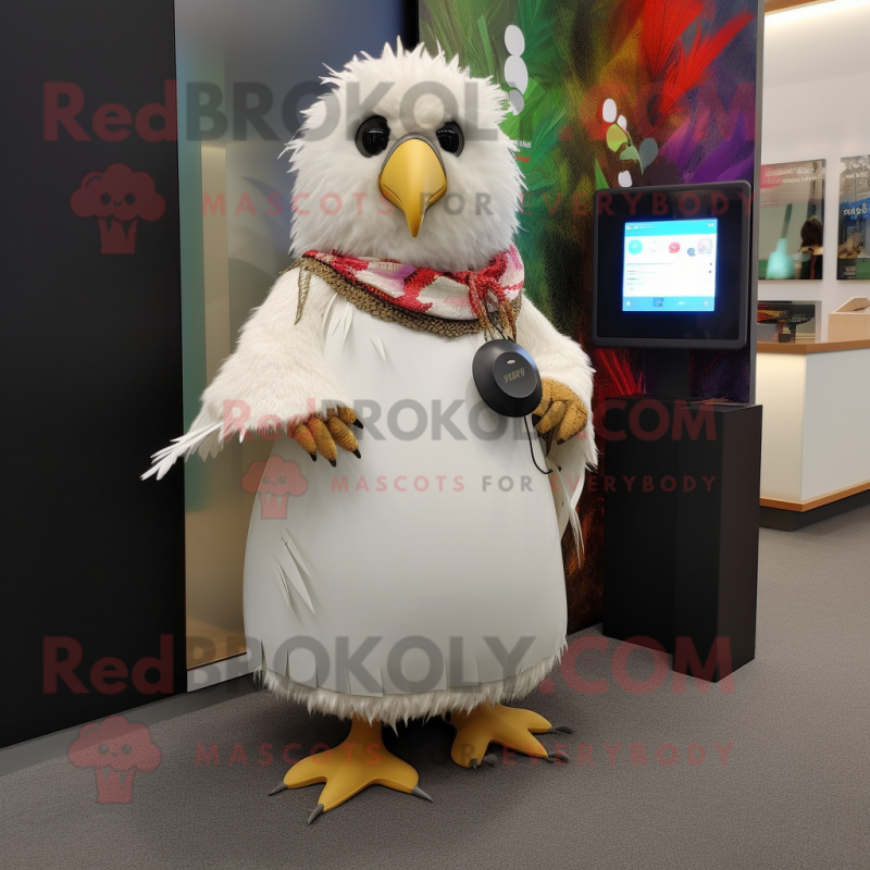 White Kiwi mascot costume character dressed with a Wrap Skirt and Clutch bags