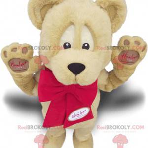 Beige beer mascotte met een rode strik teddybeer mascotte -