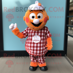 Orange Cupcake mascot costume character dressed with a Flannel Shirt and Keychains