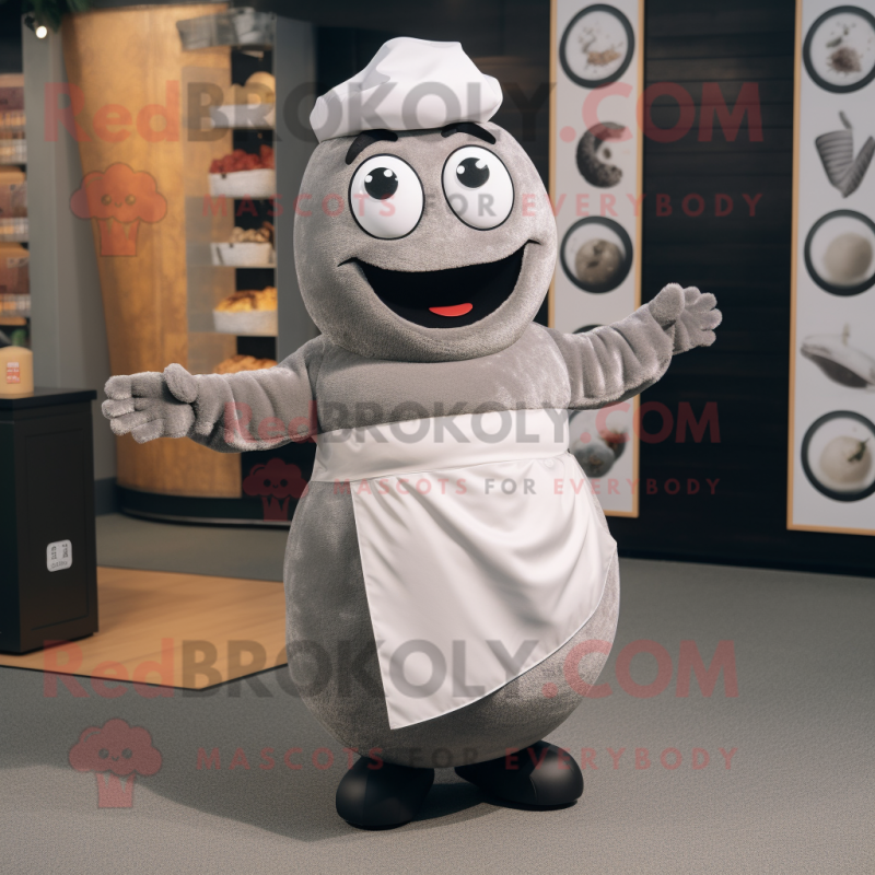 Gray Sushi mascot costume character dressed with a Wrap Skirt and Cufflinks Gray Sushi mascot costume character dressed with a Wrap Skirt and Cufflinks