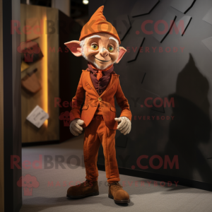 Rust Elf mascot costume character dressed with a Blazer and Lapel pins