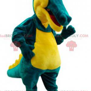 Mascota cocodrilo verde y amarillo muy cómico. - Redbrokoly.com