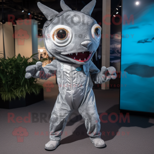 Silver Tuna mascot costume character dressed with a Jumpsuit and Headbands