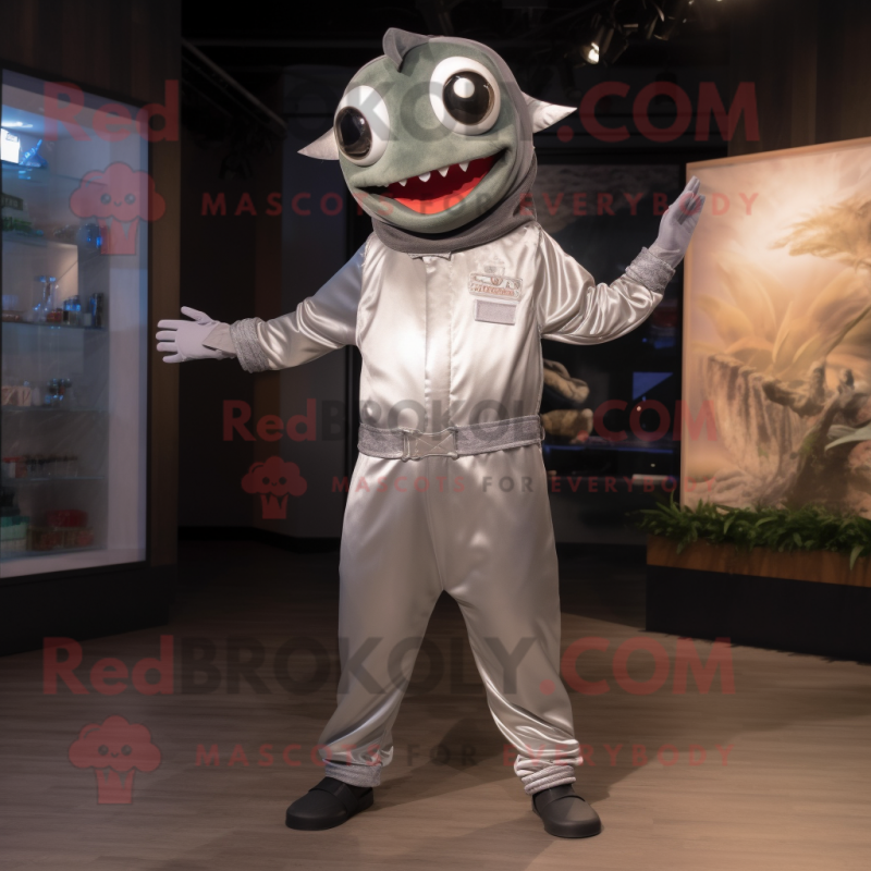 Silver Tuna mascot costume character dressed with a Jumpsuit and Headbands