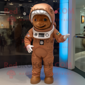 Brown Astronaut mascot costume character dressed with a T-Shirt and Hats