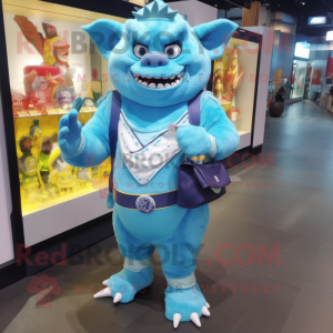 Sky Blue Ogre mascot costume character dressed with a Rash Guard and Wallets