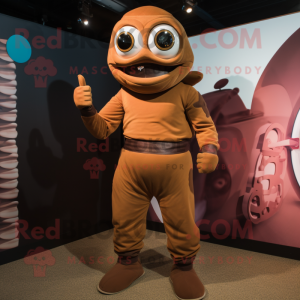 Brown Cyclops mascot costume character dressed with a Turtleneck and Belts