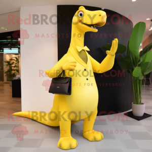 Lemon Yellow Brachiosaurus mascot costume character dressed with a Dress Shirt and Clutch bags