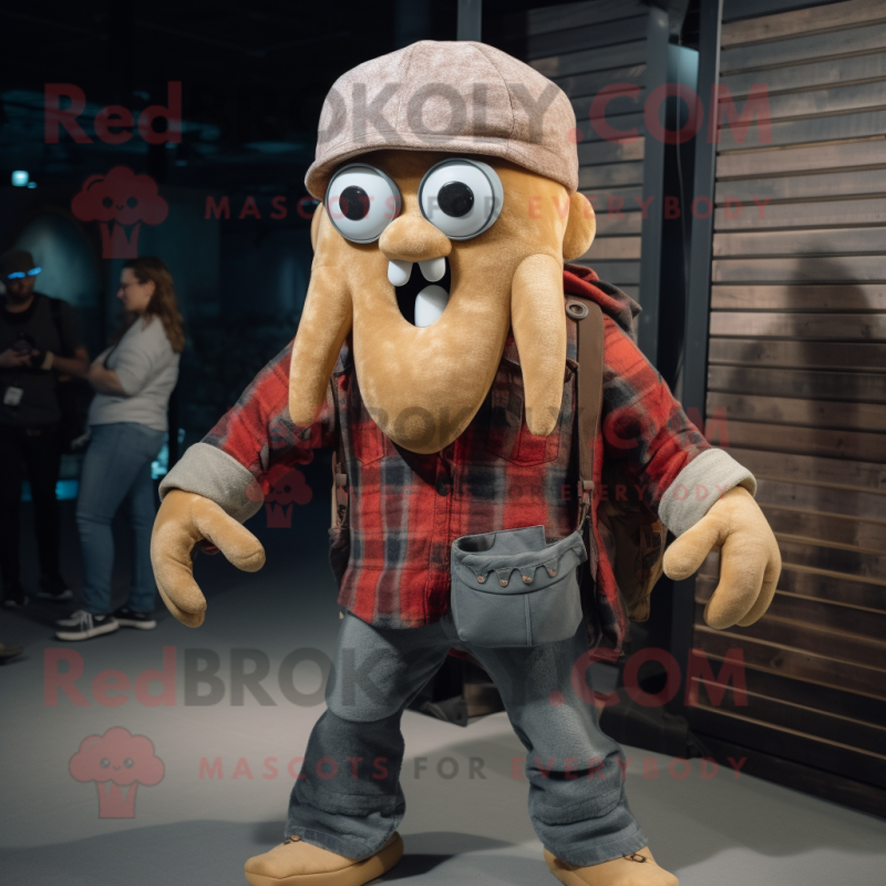 Tan Kraken mascot costume character dressed with a Flannel Shirt and Brooches