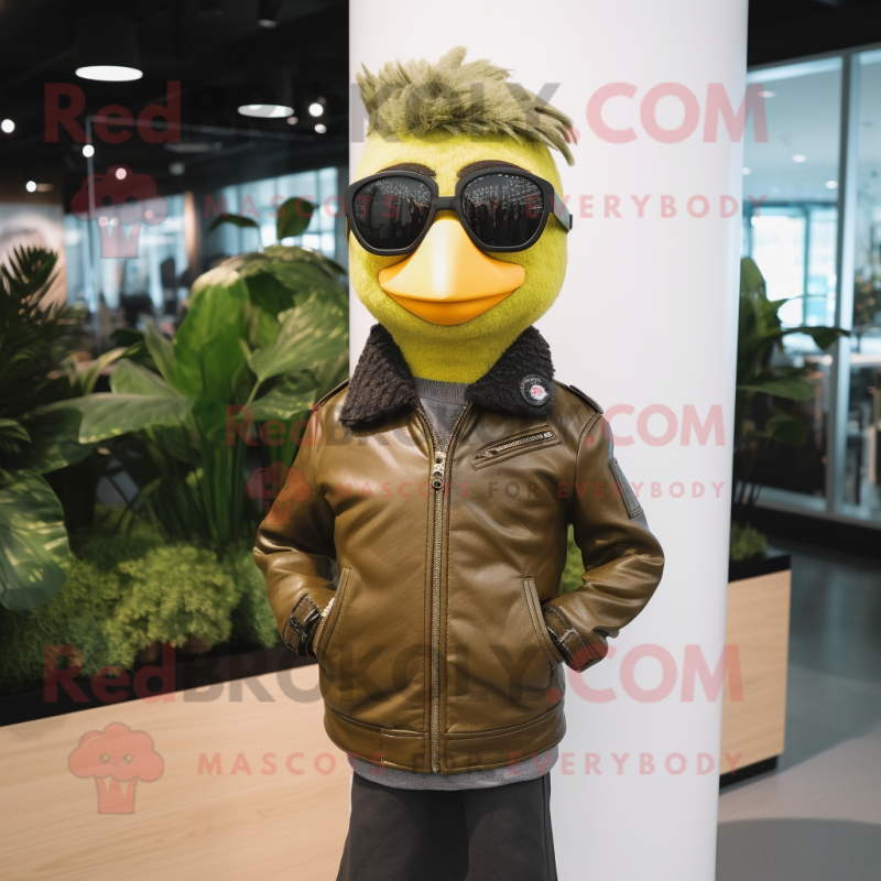 Olive Canary mascot costume character dressed with a Leather Jacket and Eyeglasses